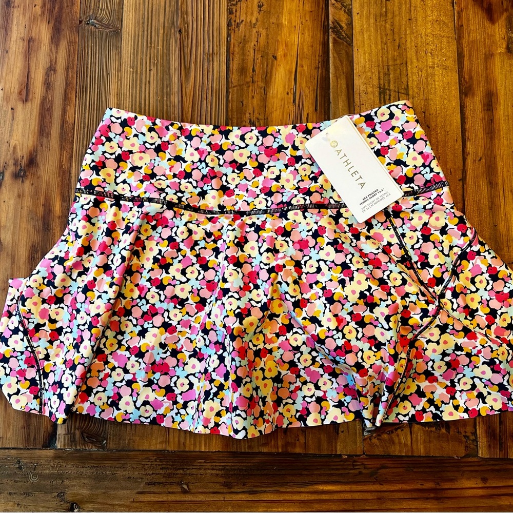 Athleta Ace 13.5” Tennis skirt Medium.  Floral print.  New with tags.